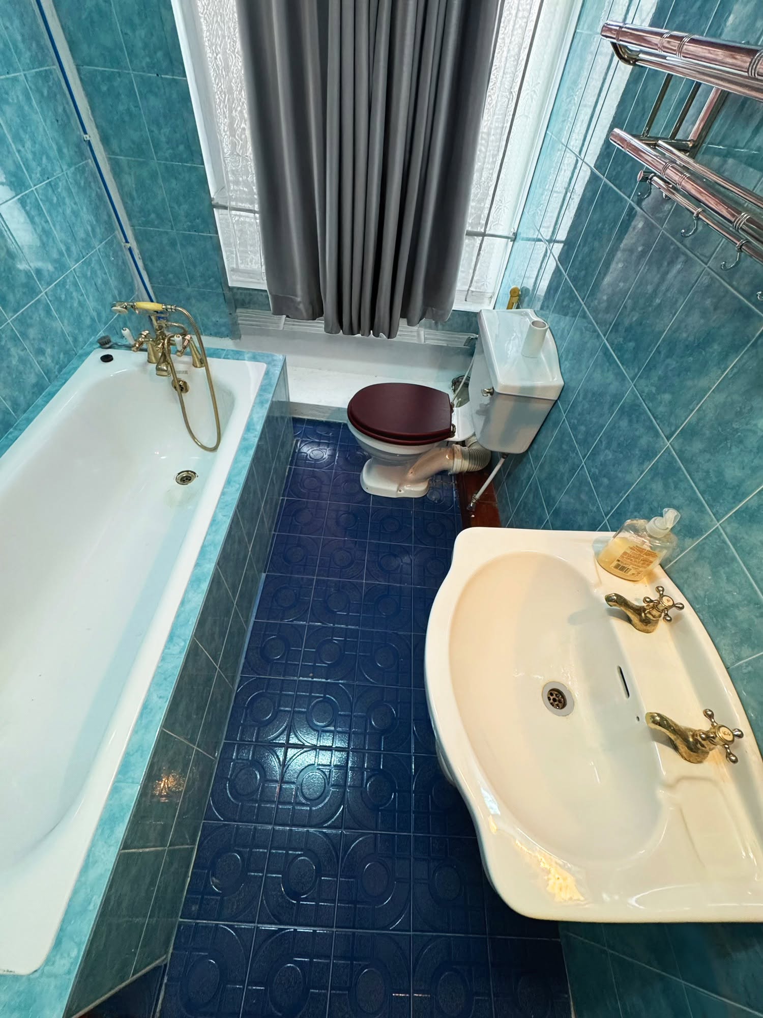 Main bathroom with bathtub and shower