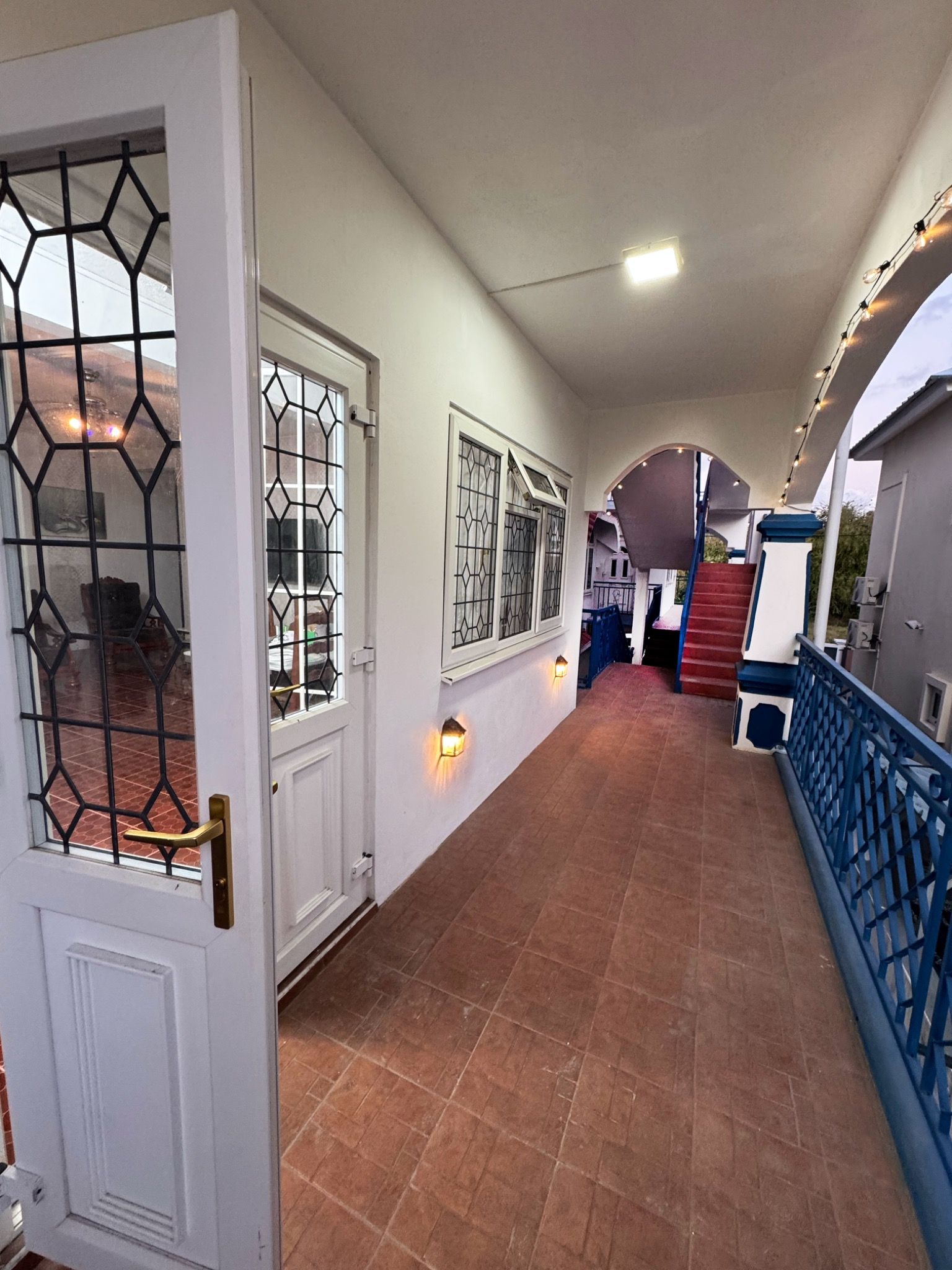 Apartment entrance and balcony approach