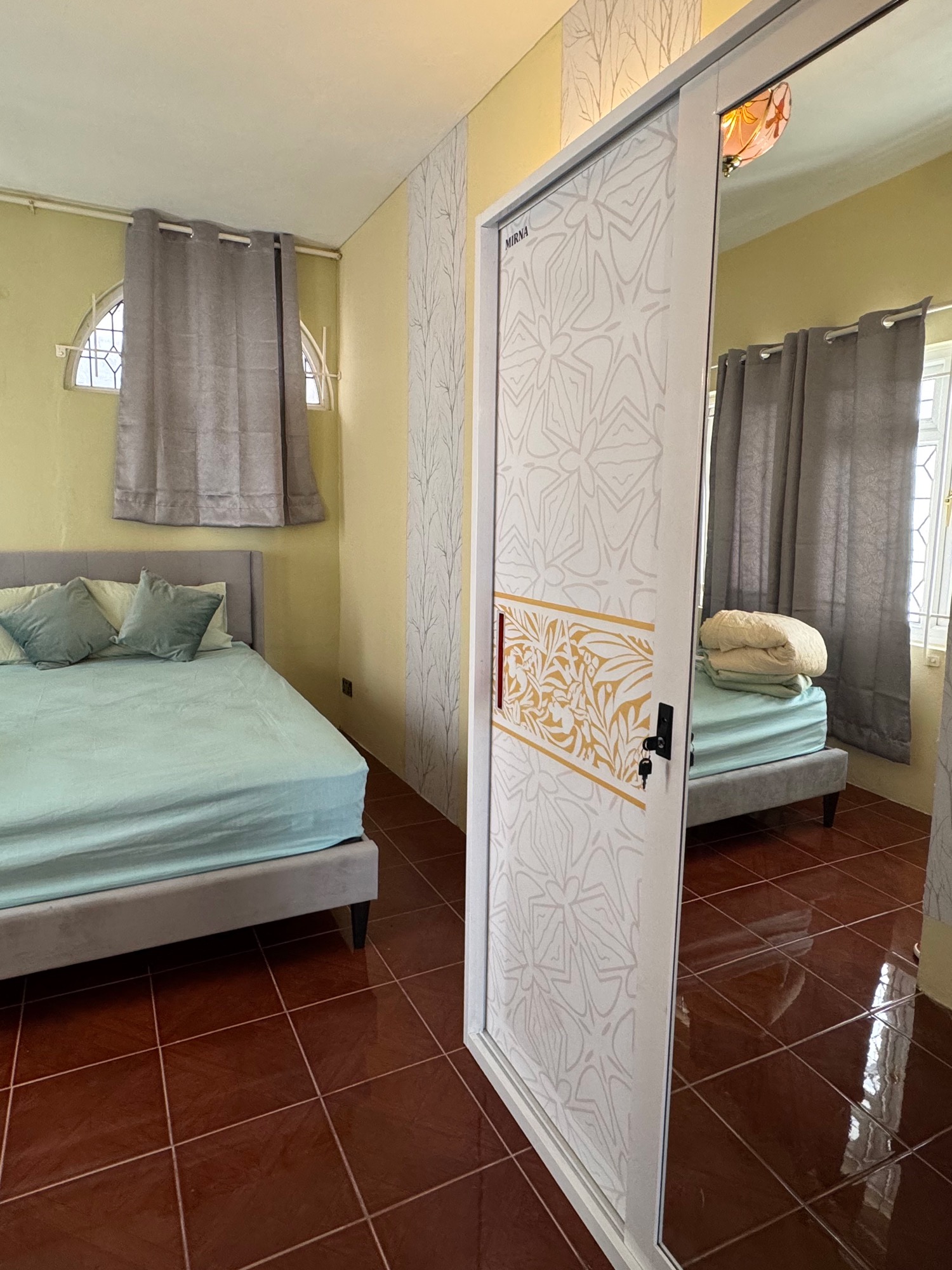Bedroom 1 · Mirror and wardrobe area